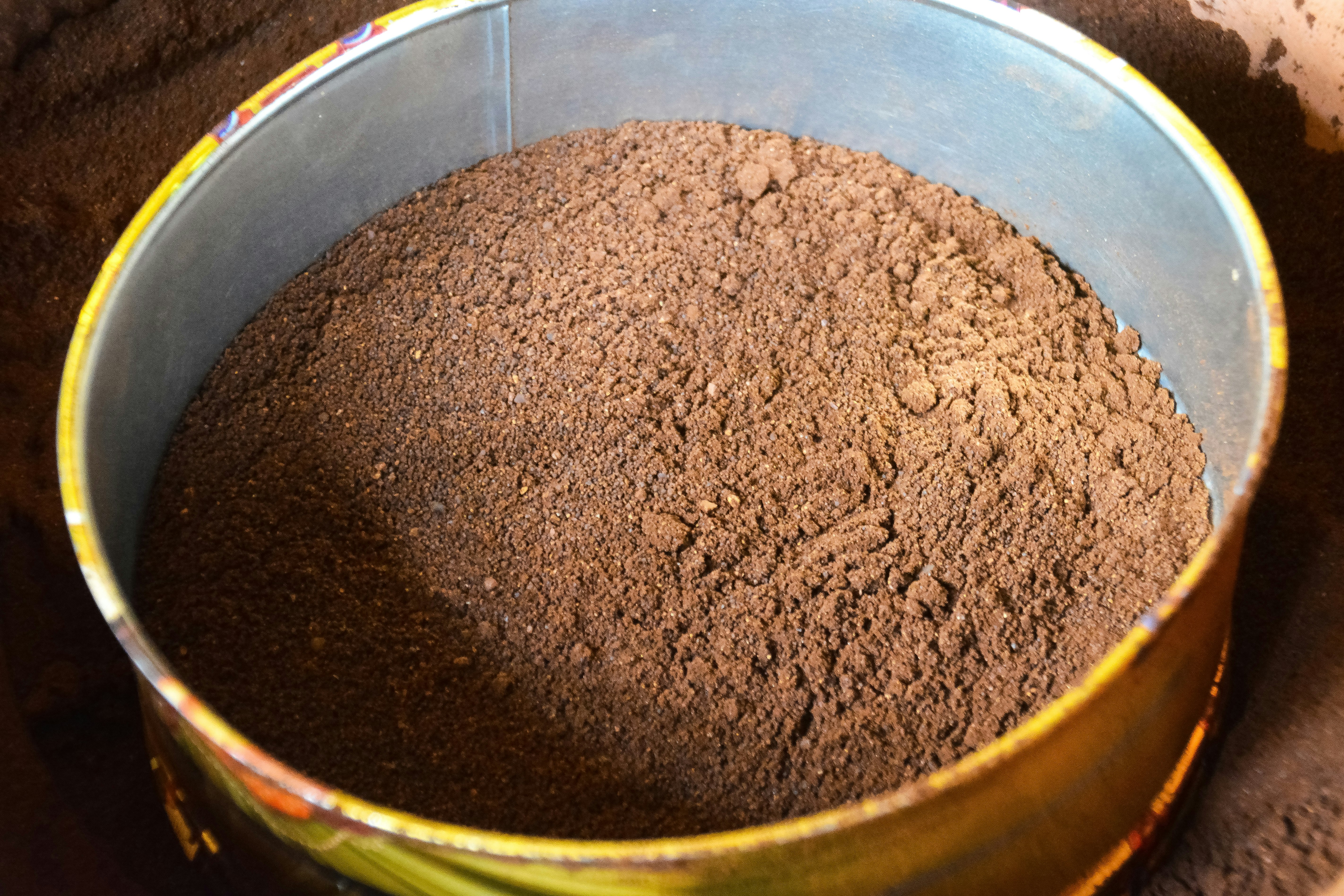 brown powder in stainless steel bowl